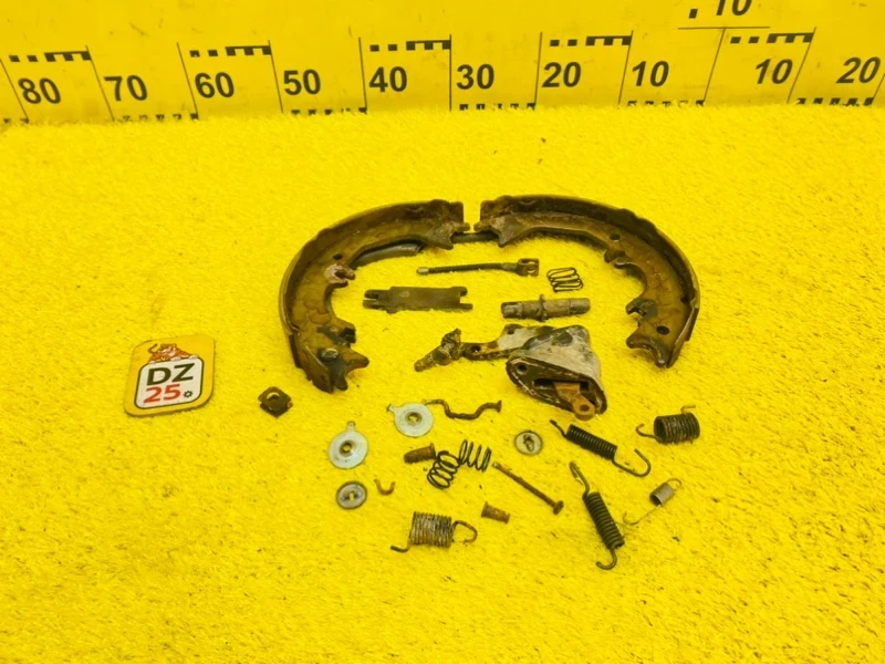 Фото для Механизм стояночного тормоза TOYOTA LAND CRUISER FZJ80G 1FZFE 1993/ Цвет 26P задн. прав. (б/у)